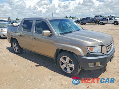 Czwarte zdjęcie samochodu z boku: 2009 HONDA RIDGELINE RTL VIN:5FPYK16579B104495 - miniatura