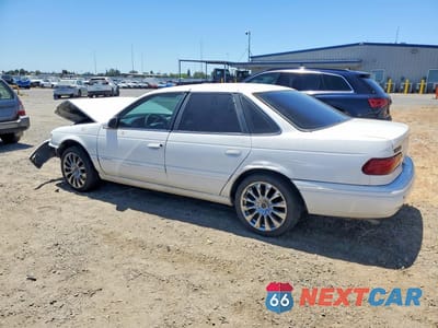 Drugie zdjęcie samochodu z przodu: 1995 FORD TAURUS GL VIN:1FALP52U2SA122335 - miniatura