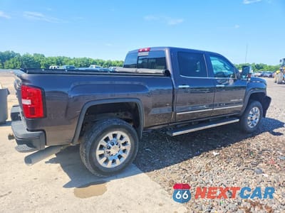 Trzecie zdjęcie samochodu z tyłu: 2015 GMC 2500 VIN:1GT120E81FF633030 - miniatura