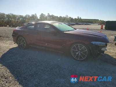 Czwarte zdjęcie samochodu z boku: 2020 BMW M850XI VIN:WBABC4C04LCD19682 - miniatura