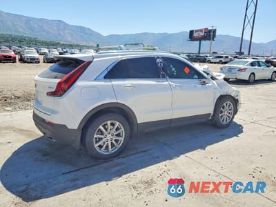 Trzecie zdjęcie samochodu z tyłu: 2022 CADILLAC XT4 LUXURY VIN:1GYFZBR40NF128304 - miniatura