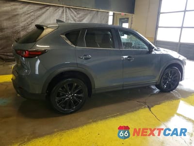 Trzecie zdjęcie samochodu z tyłu: 2022 MAZDA CX-5 PREFERRED VIN:JM3KFBCM3N0548378 - miniatura