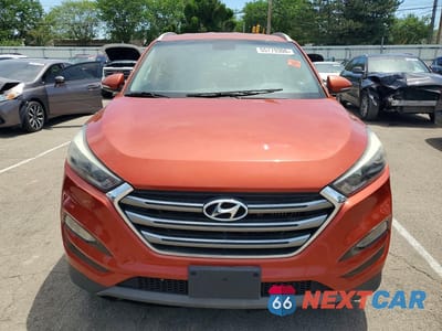 Piąte zdjęcie samochodu w środku: 2016 HYUNDAI TUCSON LIMITED VIN:KM8J33A29GU230664 - miniatura