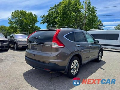 Czwarte zdjęcie samochodu z boku: 2014 HONDA CR-V EXL VIN:2HKRM4H78EH701593 - miniatura