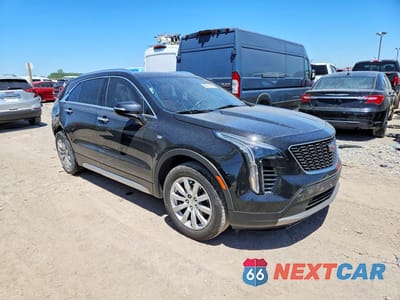 Czwarte zdjęcie samochodu z boku: 2021 CADILLAC XT4 PREMIUM LUXURY VIN:1GYFZDR49MF020175 - miniatura