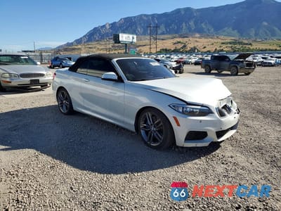 Czwarte zdjęcie samochodu z boku: 2015 BMW 228 I VIN:WBA1K5C51FV473885 - miniatura