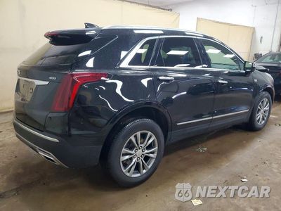 Trzecie zdjęcie samochodu z tyłu: 2021 CADILLAC XT5 PREMIUM LUXURY VIN:1GYKNDRS9MZ138301 - miniatura