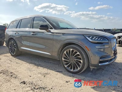 Czwarte zdjęcie samochodu z boku: 2022 LINCOLN AVIATOR RESERVE VIN:5LM5J7WCXNGL15893 - miniatura