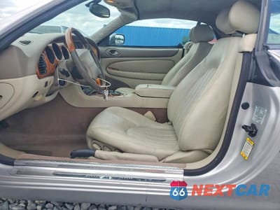 Zdjęcie 7 z 12 samochodu: 2001 JAGUAR XK8 VIN:SAJDA42C11NA22756 - miniatura