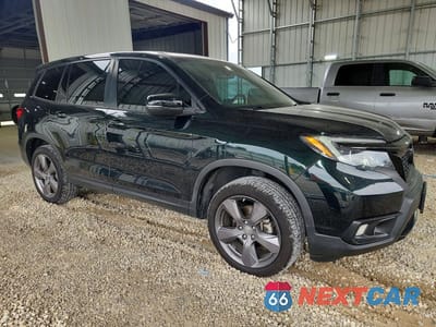 Czwarte zdjęcie samochodu z boku: 2020 HONDA PASSPORT EXL VIN:5FNYF8H57LB016394 - miniatura
