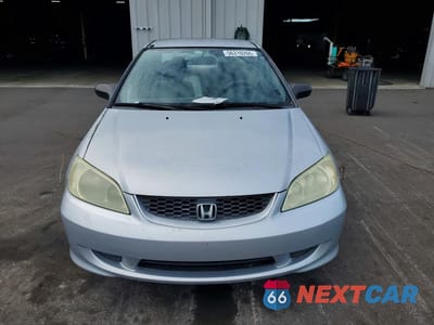 Piąte zdjęcie samochodu w środku: 2005 HONDA CIVIC DX VP VIN:1HGEM22105L007758 - miniatura