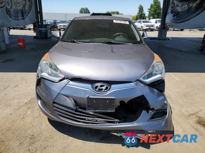 Piąte zdjęcie samochodu w środku: 2014 HYUNDAI VELOSTER BASE VIN:KMHTC6AD6EU193565 - miniatura