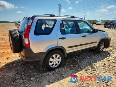 Trzecie zdjęcie samochodu z tyłu: 2006 HONDA CR-V LX VIN:JHLRD78536C042712 - miniatura