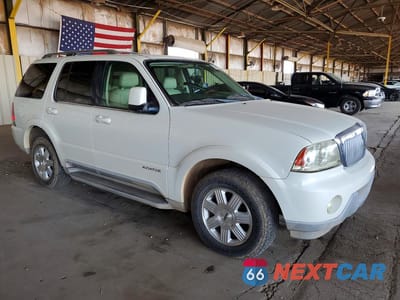 Czwarte zdjęcie samochodu z boku: 2004 LINCOLN AVIATOR VIN:5LMEU88H04ZJ19583 - miniatura