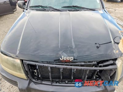 Zdjęcie 12 z 14 samochodu: 2003 JEEP GRAND CHEROKEE LAREDO VIN:1J4GW48S83C608856 - miniatura