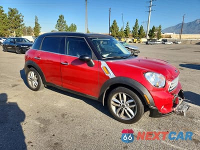 Czwarte zdjęcie samochodu z boku: 2013 MINI COOPER COUNTRYMAN VIN:WMWZB3C52DWM31112 - miniatura