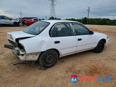 Trzecie zdjęcie samochodu z tyłu: 1994 TOYOTA COROLLA BASE VIN:1NXAE04B5RZ151483 - miniatura