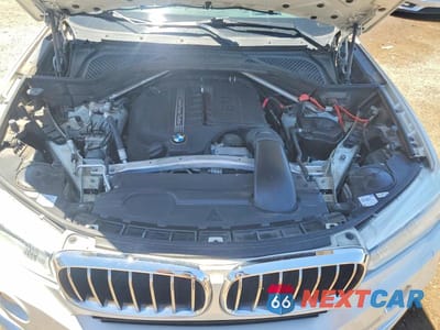 Zdjęcie 11 z 12 samochodu: 2014 BMW X5 SDRIVE35I VIN:5UXKR2C55E0C00396 - miniatura