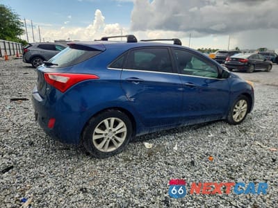 Trzecie zdjęcie samochodu z tyłu: 2014 HYUNDAI ELANTRA GT BASE VIN:KMHD35LH6EU225672 - miniatura