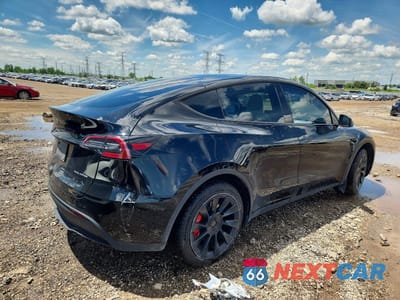 Trzecie zdjęcie samochodu z tyłu: 2023 TESLA MODEL Y VIN:7SAYGDEE5PA141734 - miniatura
