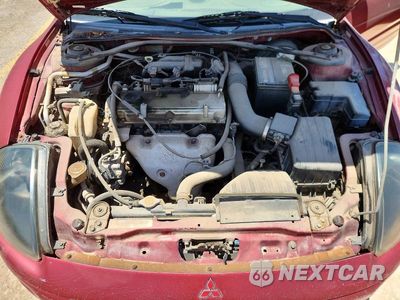 Zdjęcie 11 z 12 samochodu: 2001 MITSUBISHI ECLIPSE SPYDER GS VIN:4A3AE45G41E019574 - miniatura