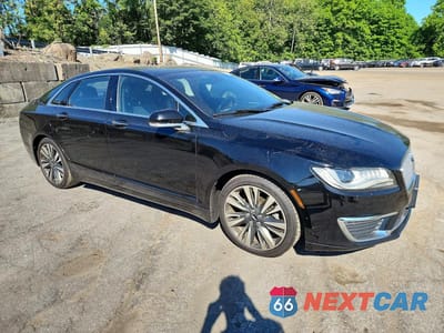 Czwarte zdjęcie samochodu z boku: 2017 LINCOLN MKZ RESERVE VIN:3LN6L5F96HR662337 - miniatura