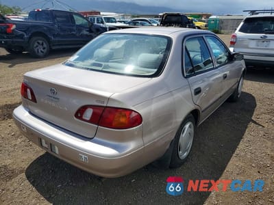 Trzecie zdjęcie samochodu z tyłu: 1999 TOYOTA COROLLA VE VIN:1NXBR12E6XZ298307 - miniatura