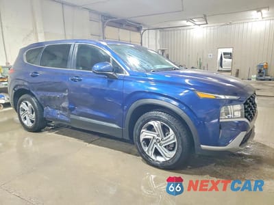 Czwarte zdjęcie samochodu z boku: 2021 HYUNDAI SANTA FE SE VIN:5NMS14AJ6MH364837 - miniatura