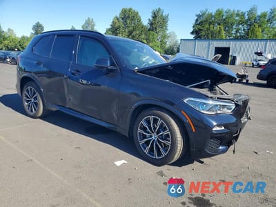 Czwarte zdjęcie samochodu z boku: 2021 BMW X5 XDRIVE40I VIN:5UXCR6C01M9G23275 - miniatura