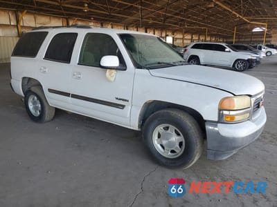 Czwarte zdjęcie samochodu z boku: 2004 GMC YUKON VIN:1GKEC13V24R209689 - miniatura