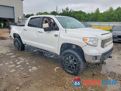 Czwarte zdjęcie samochodu z boku: 2014 TOYOTA TUNDRA CREWMAX PLATINUM VIN:5TFAY5F19EX364099 - miniatura
