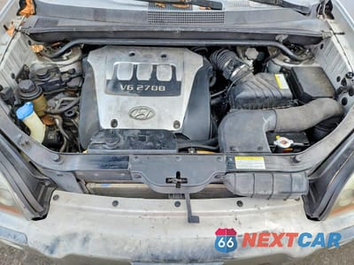 Zdjęcie 12 z 13 samochodu: 2006 HYUNDAI TUCSON GLS VIN:KM8JN12D86U265158 - miniatura