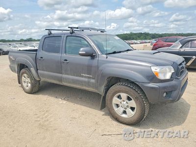 Czwarte zdjęcie samochodu z boku: 2012 TOYOTA TACOMA DOUBLE CAB VIN:5TFLU4EN5CX034007 - miniatura