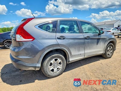 Trzecie zdjęcie samochodu z tyłu: 2014 HONDA CR-V LX VIN:2HKRM4H36EH616992 - miniatura