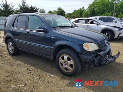 Czwarte zdjęcie samochodu z boku: 2003 MERCEDES-BENZ ML 350 VIN:4JGAB57E23A443788 - miniatura