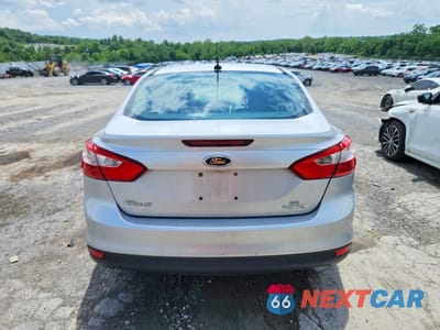 Zdjęcie 6 z 12 samochodu: 2014 FORD FOCUS SE VIN:1FADP3F26EL173346 - miniatura