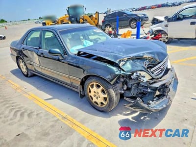 Czwarte zdjęcie samochodu z boku: 1999 ACURA 3.5RL VIN:JH4KA9654XC005478 - miniatura