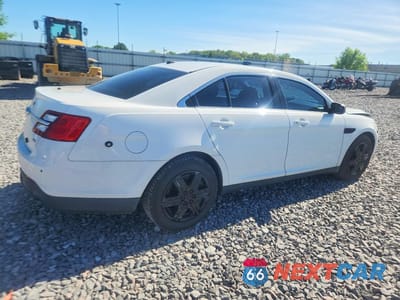 Trzecie zdjęcie samochodu z tyłu: 2015 FORD TAURUS POLICE INTERCEPTOR VIN:1FAHP2MK7FG119787 - miniatura