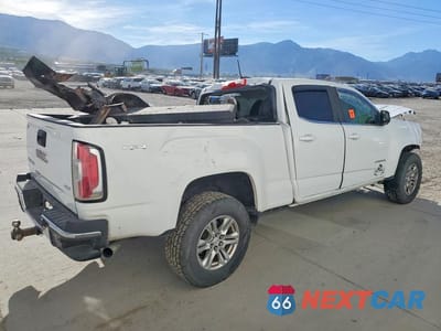 Trzecie zdjęcie samochodu z tyłu: 2019 GMC CANYON SLE VIN:1GTP6CE18K1160348 - miniatura