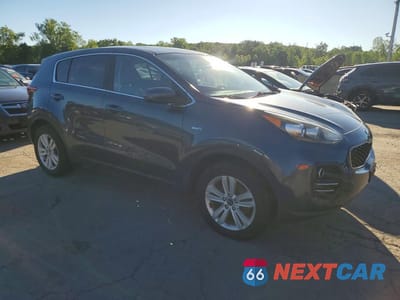 Czwarte zdjęcie samochodu z boku: 2019 KIA SPORTAGE LX VIN:KNDPMCAC3K7498797 - miniatura