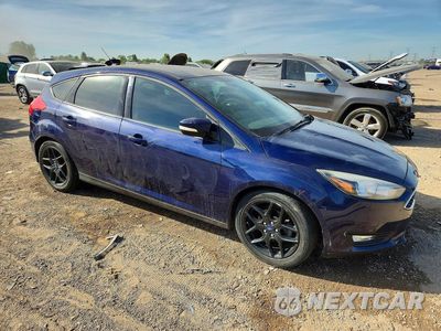 Czwarte zdjęcie samochodu z boku: 2016 FORD FOCUS SE VIN:1FADP3K20GL336694 - miniatura