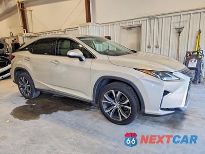Czwarte zdjęcie samochodu z boku: 2016 LEXUS RX 350 BASE VIN:2T2BZMCA4GC043584 - miniatura