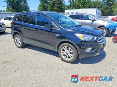 Czwarte zdjęcie samochodu z boku: 2018 FORD ESCAPE SE VIN:1FMCU9GDXJUD44813 - miniatura
