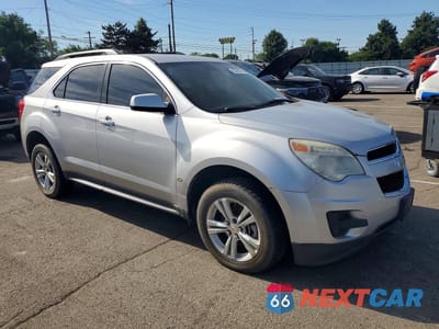 Czwarte zdjęcie samochodu z boku: 2010 CHEVROLET EQUINOX LT VIN:2CNFLEEW1A6311579 - miniatura