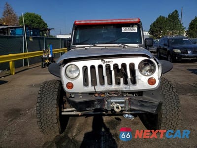 Piąte zdjęcie samochodu w środku: 2011 JEEP WRANGLER SPORT VIN:1J4AA2D1XBL548163 - miniatura