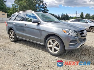 Czwarte zdjęcie samochodu z boku: 2017 MERCEDES-BENZ GLE 350 VIN:4JGDA5JB4HA825889 - miniatura