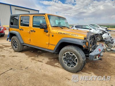 Czwarte zdjęcie samochodu z boku: 2014 JEEP WRANGLER UNLIMITED RUBICON VIN:1C4HJWFG0EL302028 - miniatura