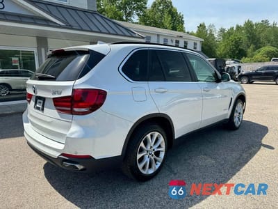 Czwarte zdjęcie samochodu z boku: 2016 BMW X5 XDR40E VIN:5UXKT0C59G0S78797 - miniatura
