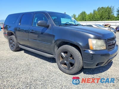 Czwarte zdjęcie samochodu z boku: 2007 CHEVROLET SUBURBAN K1500 VIN:1GNFK16347J217753 - miniatura