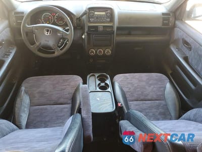 Zdjęcie 8 z 12 samochodu: 2002 HONDA CR-V LX VIN:JHLRD68412C016721 - miniatura